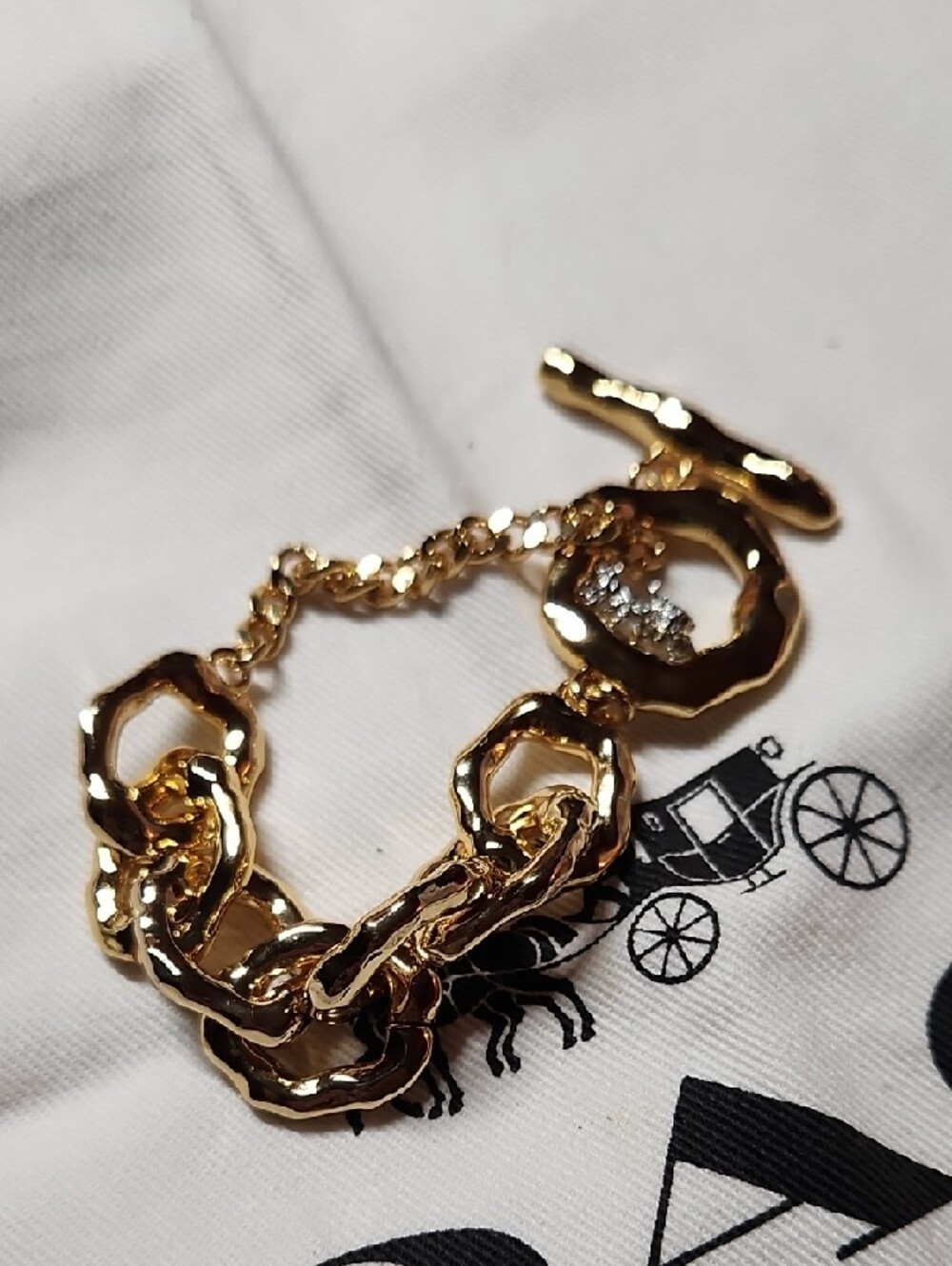 Coach Gold-Tone Chunky Link Bracelet with Dangle Charm - Picture 4 of 11